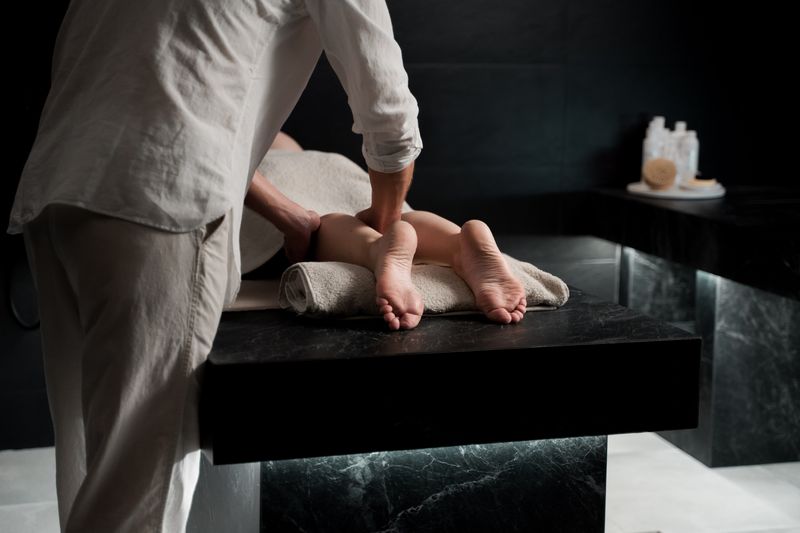 Therapist giving a relaxing foot massage